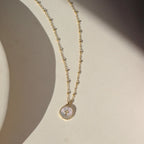 TKN Beaded Mother of Pearl Cross Necklace