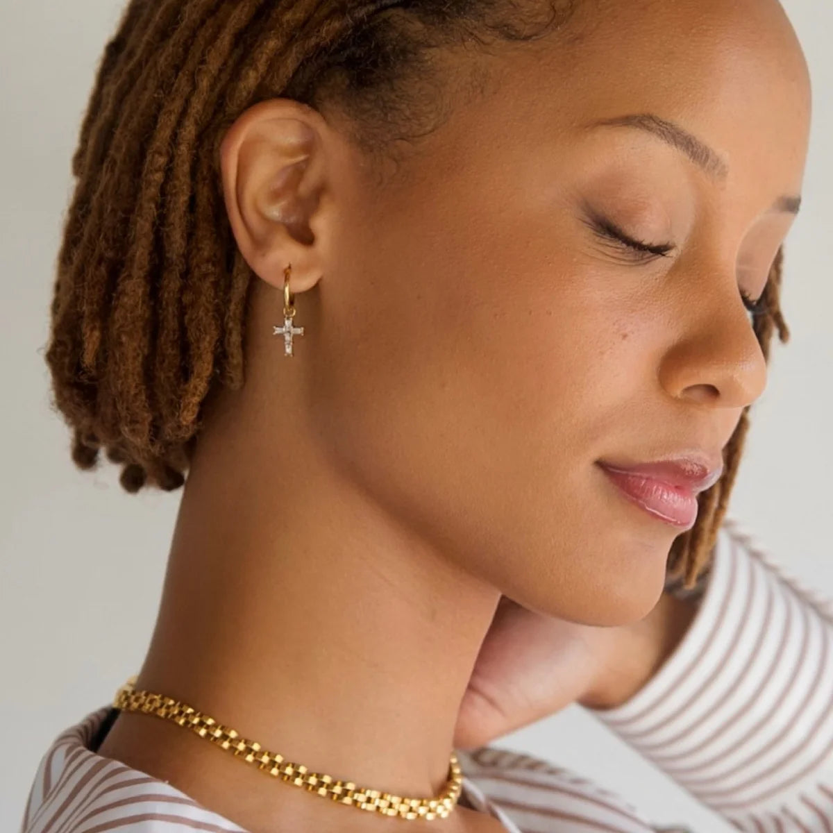 EV Taran Baguette Cross Huggie Hoop Earrings