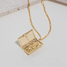 Load image into Gallery viewer, WCO Next Chapter Book Necklace
